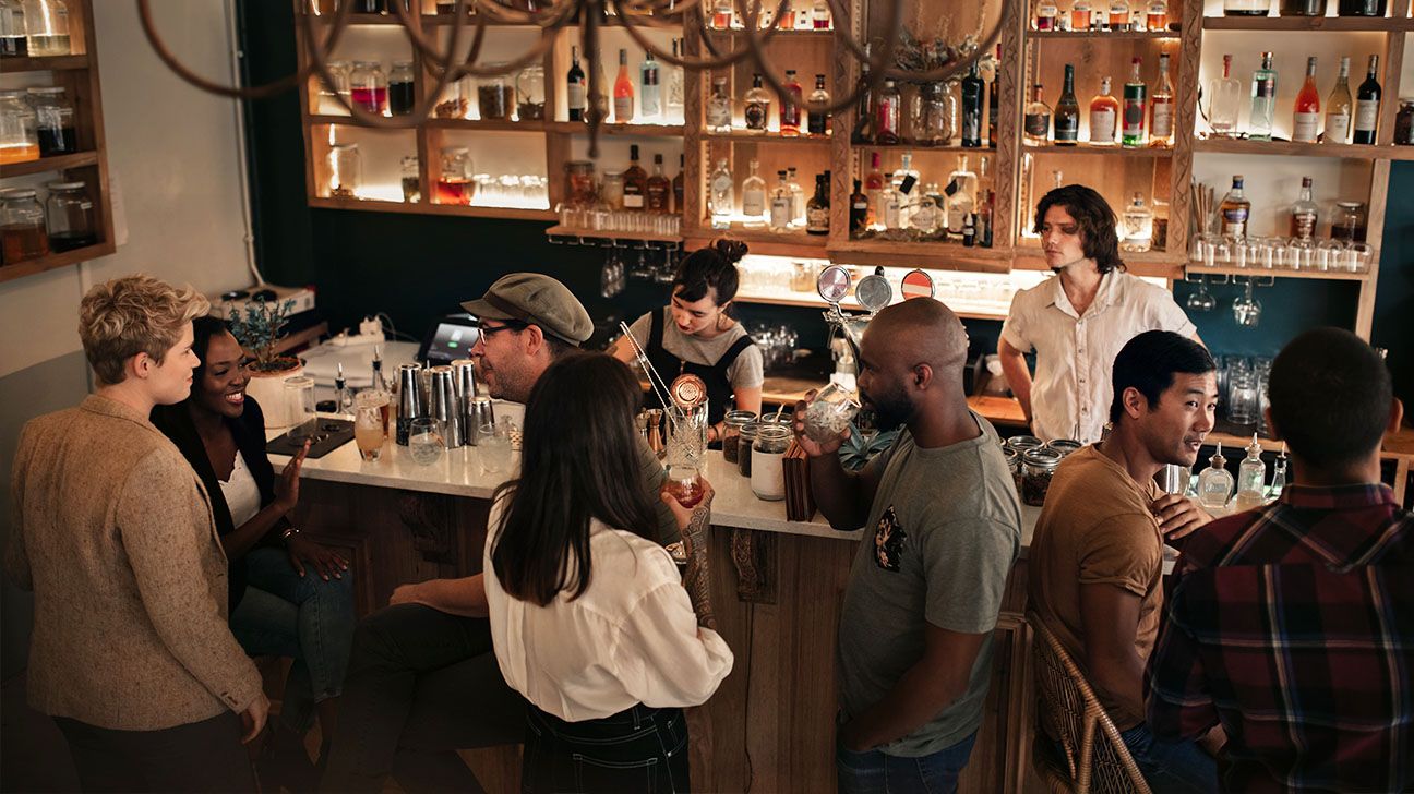 Group of young adults at a bar