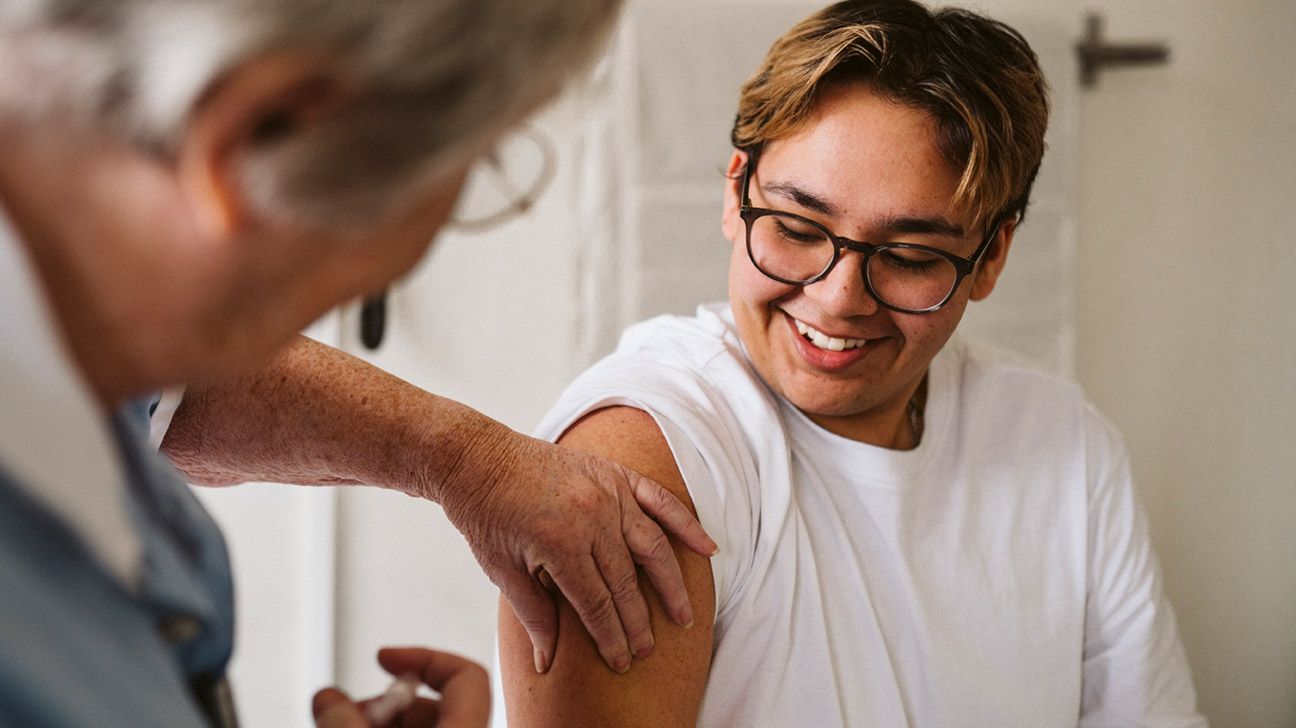 Young male getting flu shot