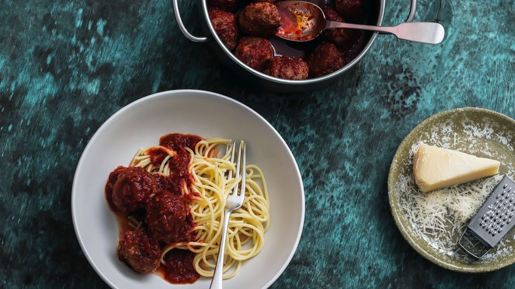 Beef meatballs in tomato sauce and spaghetti pasta