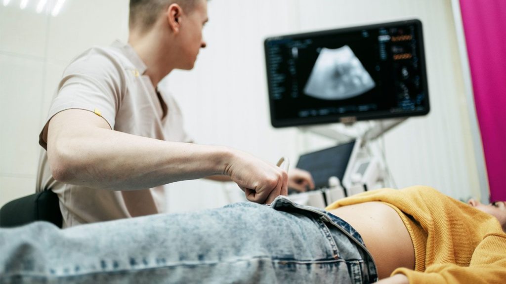 Female patient receives ultrasound