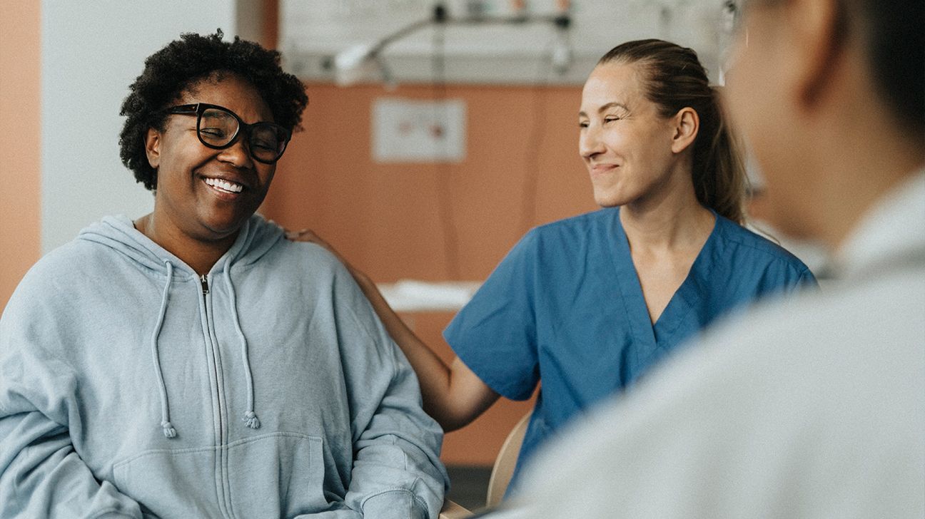 Female patient talks with doctor